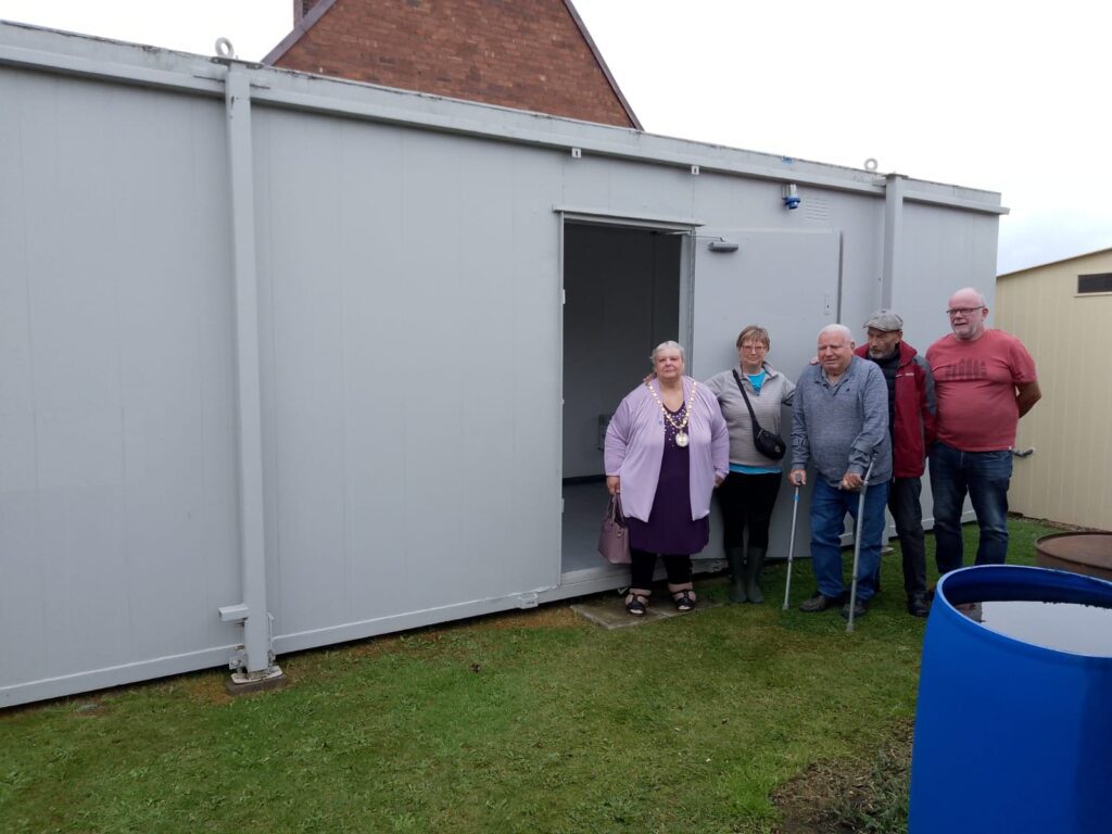 welfare cabin at Middlecroft Allotments being opened by the Chair of Staveley Town Council