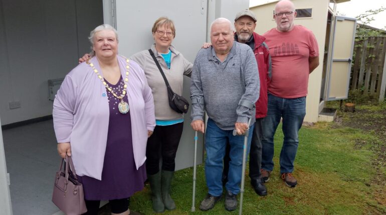 welfare cabin at Middlecroft Allotments being opened by the Chair of Staveley Town Council