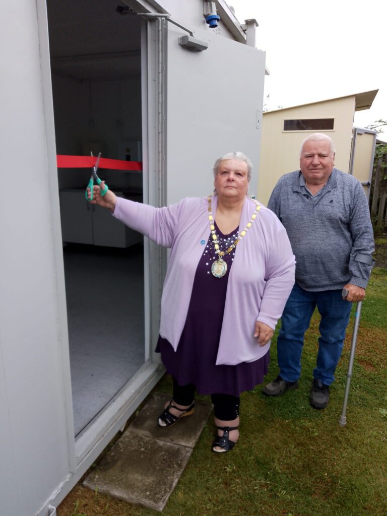 welfare cabin at Middlecroft Allotments being opened by the Chair of Staveley Town Council